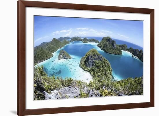 Rugged Limestone Islands Surround a Gorgeous Lagoon in Raja Ampat-Stocktrek Images-Framed Photographic Print