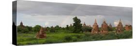 Ruined stupas with rainbow near village of Min Nan Thu, Bagan, Mandalay Region, Myanmar-null-Stretched Canvas