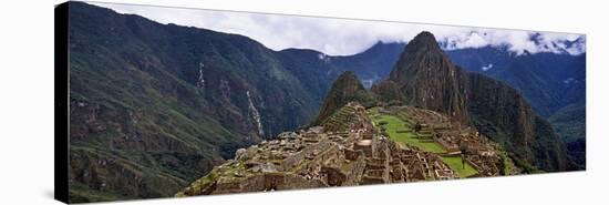 Ruins of Buildings at an Archaeological Site, Inca Ruins, Machu Picchu, Cusco Region, Peru-null-Stretched Canvas