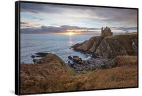 Ruins of Dunskey Castle on rugged coastline at sunset-Stuart Black-Framed Stretched Canvas