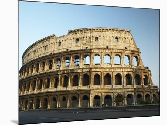 Ruins of the Coliseum in Rome Against Blue Sky-null-Mounted Photographic Print