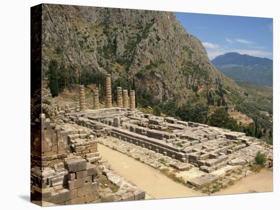 Ruins of the Temple of Apollo, with Hills in the Background, at Delphi, Greece-Ken Gillham-Stretched Canvas