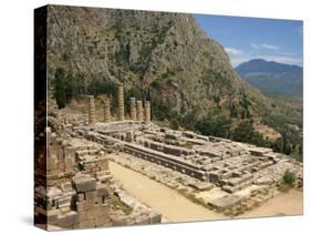 Ruins of the Temple of Apollo, with Hills in the Background, at Delphi, Greece-Ken Gillham-Stretched Canvas