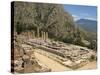 Ruins of the Temple of Apollo, with Hills in the Background, at Delphi, Greece-Ken Gillham-Stretched Canvas