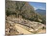 Ruins of the Temple of Apollo, with Hills in the Background, at Delphi, Greece-Ken Gillham-Mounted Photographic Print