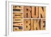 Run, Bike,  Paddle - Triathlon or Recreation Concept - Isolated Word Abstract in Vintage Letterpres-PixelsAway-Framed Photographic Print