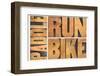 Run, Bike,  Paddle - Triathlon or Recreation Concept - Isolated Word Abstract in Vintage Letterpres-PixelsAway-Framed Photographic Print