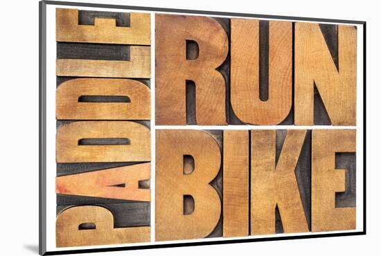 Run, Bike,  Paddle - Triathlon or Recreation Concept - Isolated Word Abstract in Vintage Letterpres-PixelsAway-Mounted Photographic Print