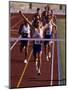 Runner Celebrates at the Finish Line-null-Mounted Photographic Print