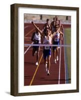 Runner Celebrates at the Finish Line-null-Framed Photographic Print