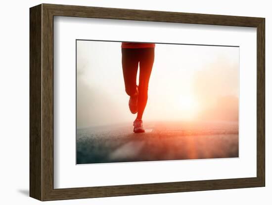 Runner Feet Running on Road Closeup on Shoe. Woman Fitness Sunrise Jog Workout Welness Concept.-warrengoldswain-Framed Photographic Print