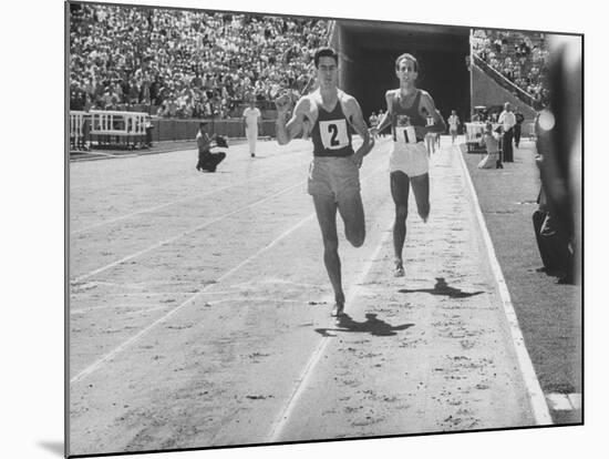 Runner John Landy, Breaking the 4 Minute Mile-Allan Grant-Mounted Photographic Print