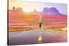 Runner Man Athlete Running Sprinting on Road by Monument Valley. Concept with Sprinter Fast Trainin-Maridav-Stretched Canvas