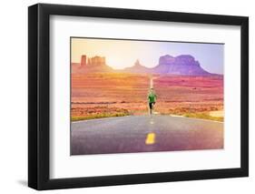 Runner Man Athlete Running Sprinting on Road by Monument Valley. Concept with Sprinter Fast Trainin-Maridav-Framed Photographic Print