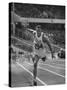 Runner Milt Campbell Competing in the Olympics-John Dominis-Stretched Canvas