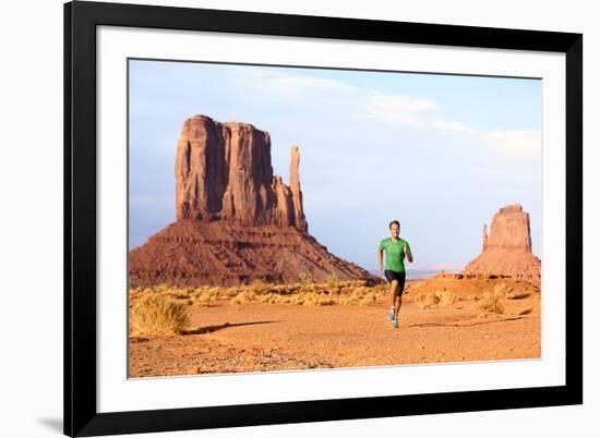 Runner. Running Man Sprinting in Monument Valley. Athlete Runner Cross Country Trail Running Outdoo-Maridav-Framed Photographic Print