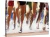 Runners Legs Splashing Through Water Jump of Track and Field Steeplechase Race, Sydney, Australia-Paul Sutton-Stretched Canvas