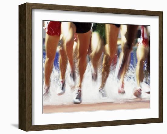 Runners Legs Splashing Through Water Jump of Track and Field Steeplechase Race, Sydney, Australia-Paul Sutton-Framed Premium Photographic Print