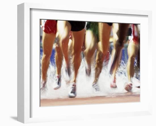 Runners Legs Splashing Through Water Jump of Track and Field Steeplechase Race, Sydney, Australia-Paul Sutton-Framed Premium Photographic Print