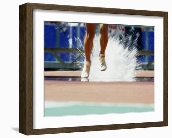 Runners Legs Splashing Through Water Jump of Track and Field Steeplechase Race, Sydney, Australia-Paul Sutton-Framed Photographic Print