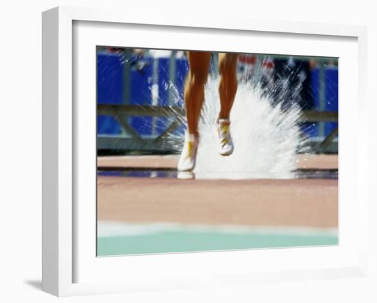 Runners Legs Splashing Through Water Jump of Track and Field Steeplechase Race, Sydney, Australia-Paul Sutton-Framed Photographic Print