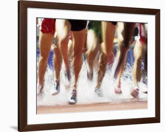 Runners Legs Splashing Through Water Jump of Track and Field Steeplechase Race, Sydney, Australia-Paul Sutton-Framed Photographic Print