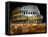 Runners Make Their Way Past the Colosseum in Rome-null-Framed Stretched Canvas
