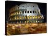 Runners Make Their Way Past the Colosseum in Rome-null-Stretched Canvas