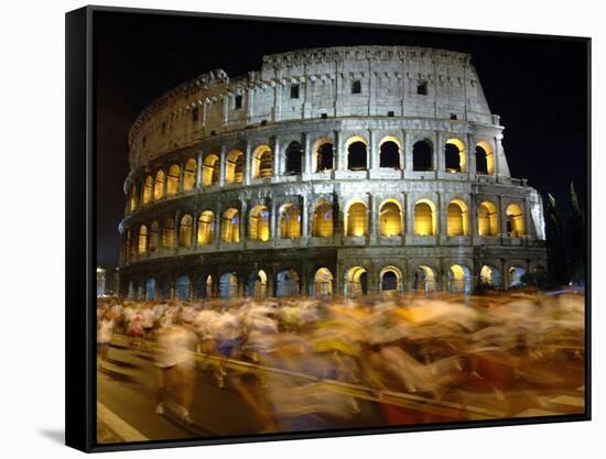 Runners Make Their Way Past the Colosseum in Rome-null-Framed Stretched Canvas