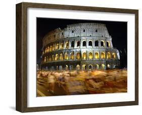 Runners Make Their Way Past the Colosseum in Rome-null-Framed Premium Photographic Print