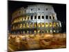 Runners Make Their Way Past the Colosseum in Rome-null-Mounted Premium Photographic Print