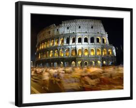 Runners Make Their Way Past the Colosseum in Rome-null-Framed Photographic Print