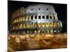 Runners Make Their Way Past the Colosseum in Rome-null-Mounted Photographic Print