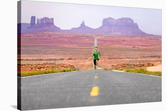 Running Man - Runner Sprinting on Road by Monument Valley. Concept with Sprinting Fast Training For-Maridav-Stretched Canvas