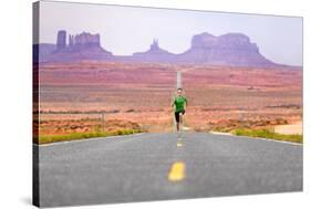 Running Man - Runner Sprinting on Road by Monument Valley. Concept with Sprinting Fast Training For-Maridav-Stretched Canvas