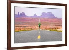 Running Man - Runner Sprinting on Road by Monument Valley. Concept with Sprinting Fast Training For-Maridav-Framed Photographic Print