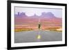 Running Man - Runner Sprinting on Road by Monument Valley. Concept with Sprinting Fast Training For-Maridav-Framed Photographic Print