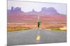 Running Man - Runner Sprinting on Road by Monument Valley. Concept with Sprinting Fast Training For-Maridav-Mounted Photographic Print
