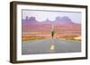 Running Man - Runner Sprinting on Road by Monument Valley. Concept with Sprinting Fast Training For-Maridav-Framed Photographic Print