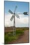 Running Old Metal Windmill-Ruud Morijn-Mounted Photographic Print