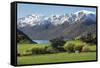 Rural scene of Lake Wanaka backed by snow capped mountains, New Zealand-Ed Rhodes-Framed Stretched Canvas