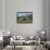 Rural scene of Lake Wanaka backed by snow capped mountains, New Zealand-Ed Rhodes-Framed Photographic Print displayed on a wall