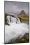 Rushing glacial run-off feeds Kirkjufellfoss on the Snaefellsness Peninsula, Iceland, Polar Regions-Jon Reaves-Mounted Photographic Print