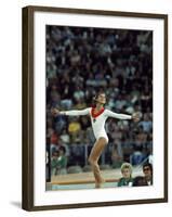 Russian Gymnast Olga Korbut Performing Floor Exercises at Summer Olympics-John Dominis-Framed Premium Photographic Print