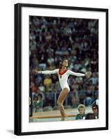 Russian Gymnast Olga Korbut Performing Floor Exercises at Summer Olympics-John Dominis-Framed Premium Photographic Print