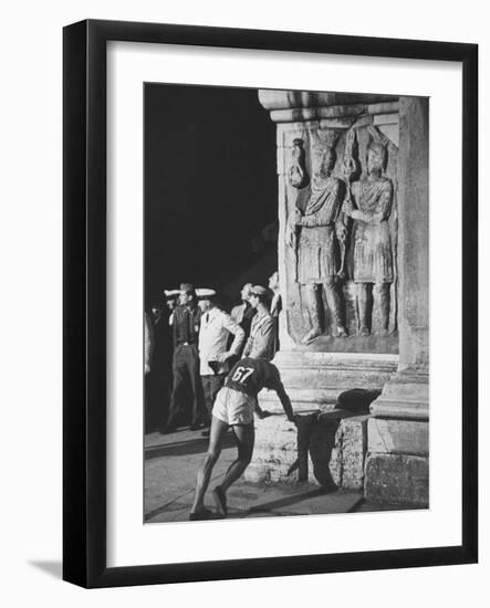 Russian Olympic Runner Rests on Constantines Arch, after Placing 4th in Marathon-null-Framed Photographic Print