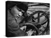 Russian Steel Worker Turning Gear Wheel in a Steel Mill-Margaret Bourke-White-Stretched Canvas