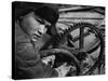 Russian Steel Worker Turning Gear Wheel in a Steel Mill-Margaret Bourke-White-Stretched Canvas