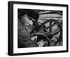 Russian Steel Worker Turning Gear Wheel in a Steel Mill-Margaret Bourke-White-Framed Photographic Print