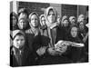 Russian Woman Grimly Holding a Slab of Meat as Other Peasant Women Staunchly Stand by in Siberia-Margaret Bourke-White-Stretched Canvas